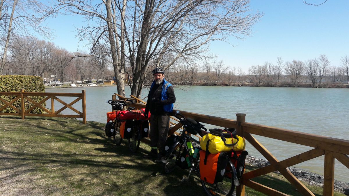 Tim with his fully loaded touring bicycle in Ontario