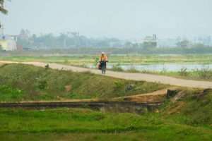 Cycling on Vietnamese levee banks in Northern vietnam