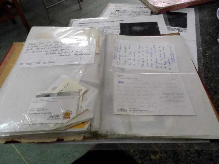 A picture of notes and postcards with the thoughts of many travelers on Pho Binh, the Vietnam War and the futility of war in general.