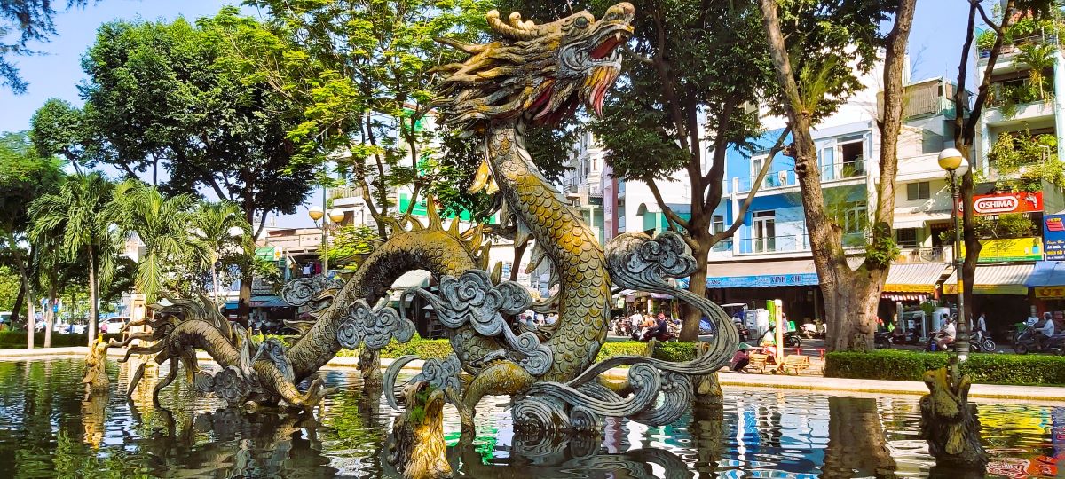 Dragon statue in pond in cho lon saigon