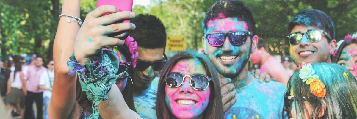Friends taking a selfi at the color festival